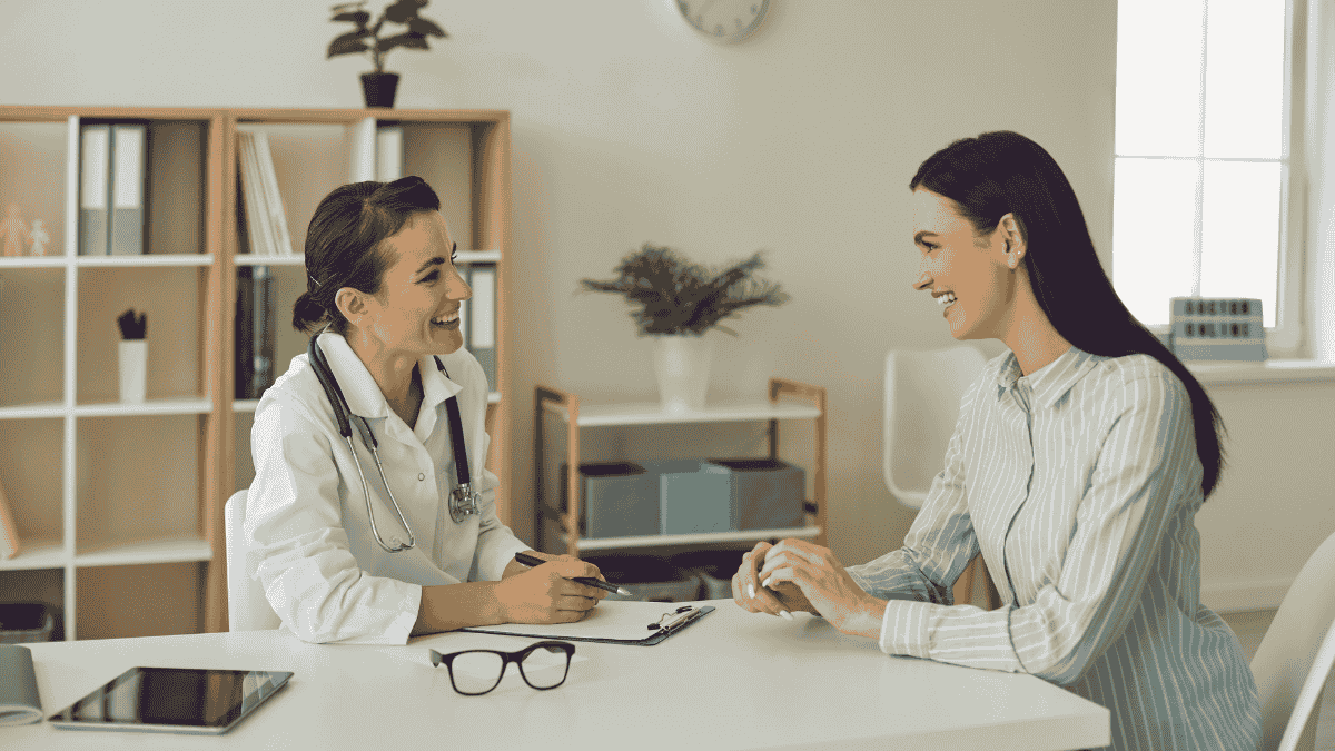 Doctor discussing with patient the advantages of Medicare Advantage vs Medicare Supplement plans.