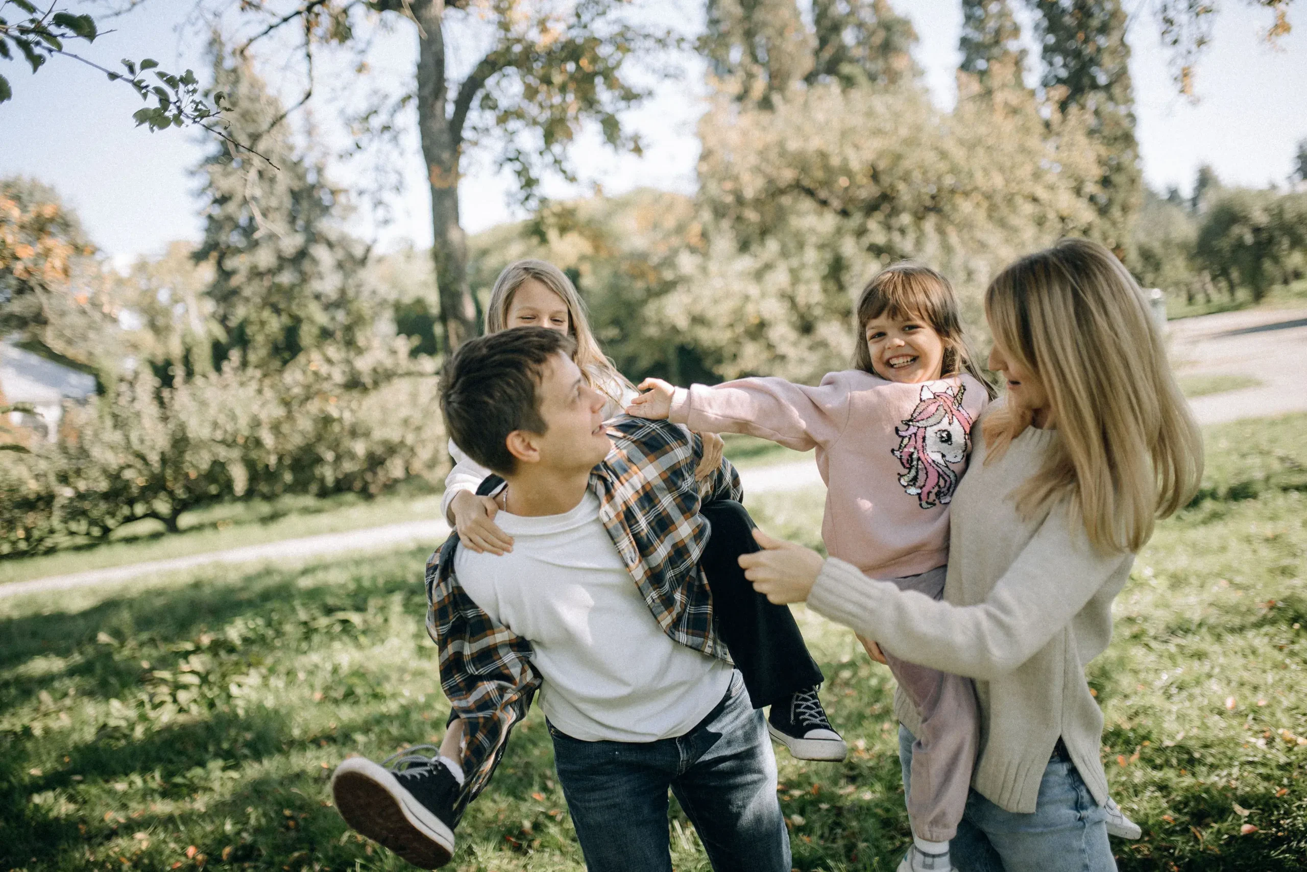 Family playing out in their front yard